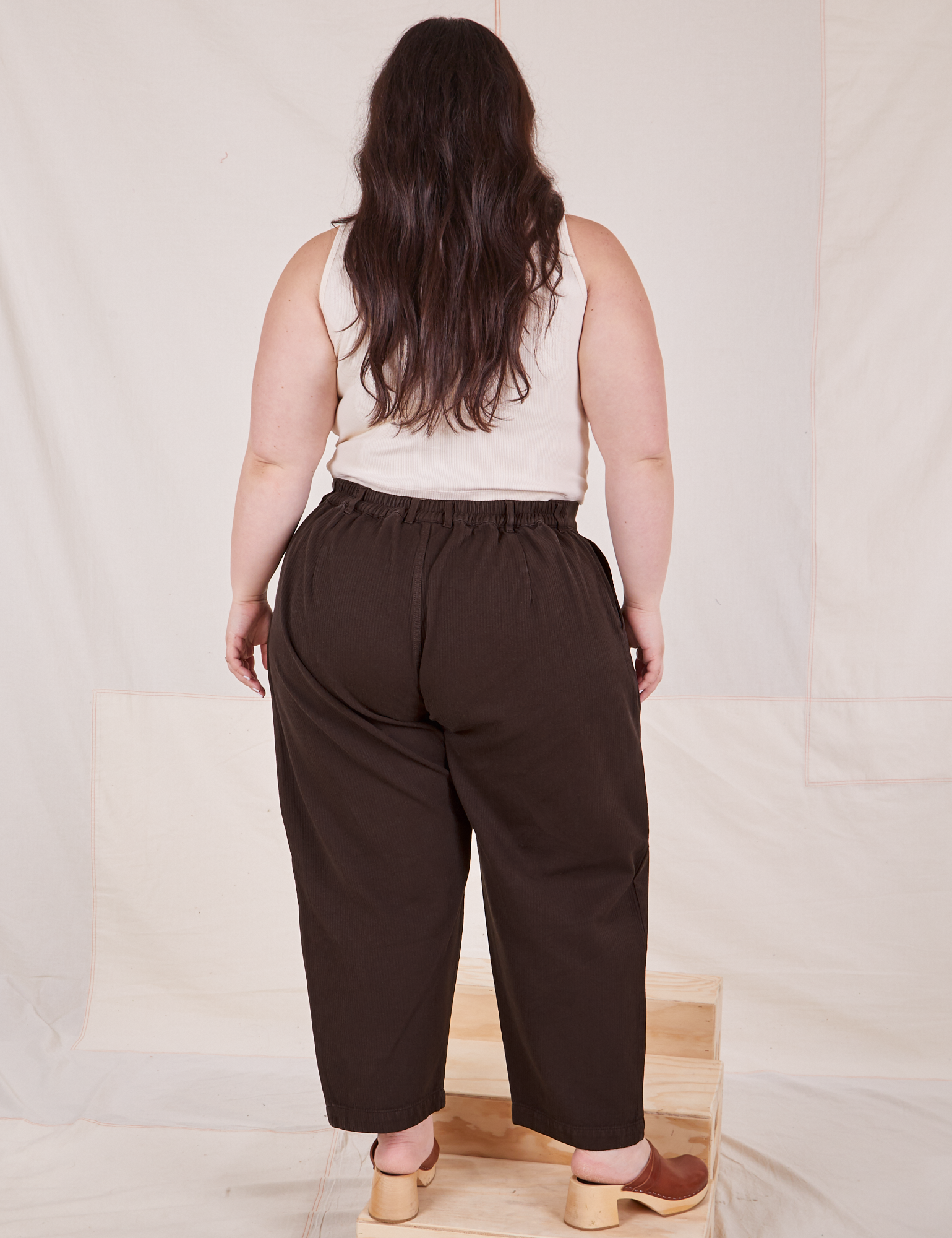 Back view Heritage Trousers in Espresso Brown worn by Ashley