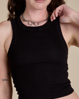 Racerback Tank in Black close up on Alex
