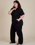 Short Sleeve Jumpsuit in Basic Black side view on Ashley