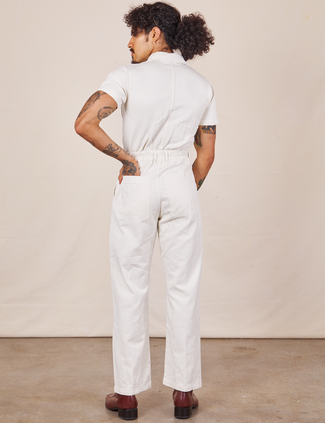 Back view of Short Sleeve Jumpsuit in Vintage Tee Off-White worn by Jesse