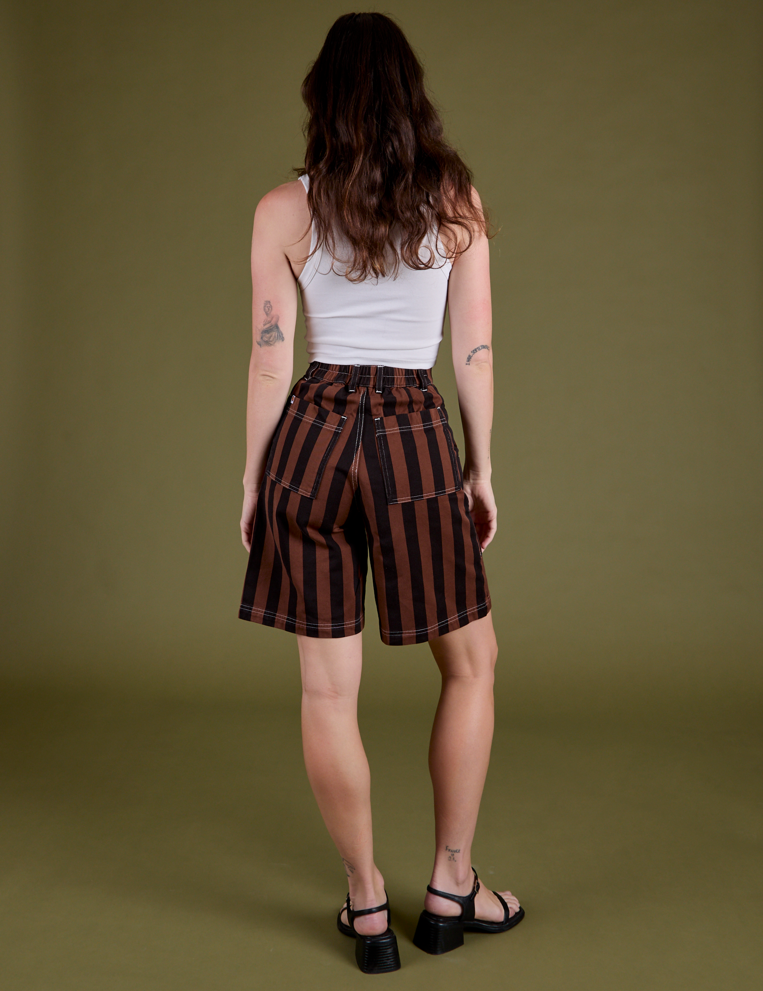 Longline Work Shorts in Fudgesicle Brown back view on Alex