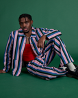 Isaac is wearing Work Pants in Pacific Stripe paired with matching Work Jacket