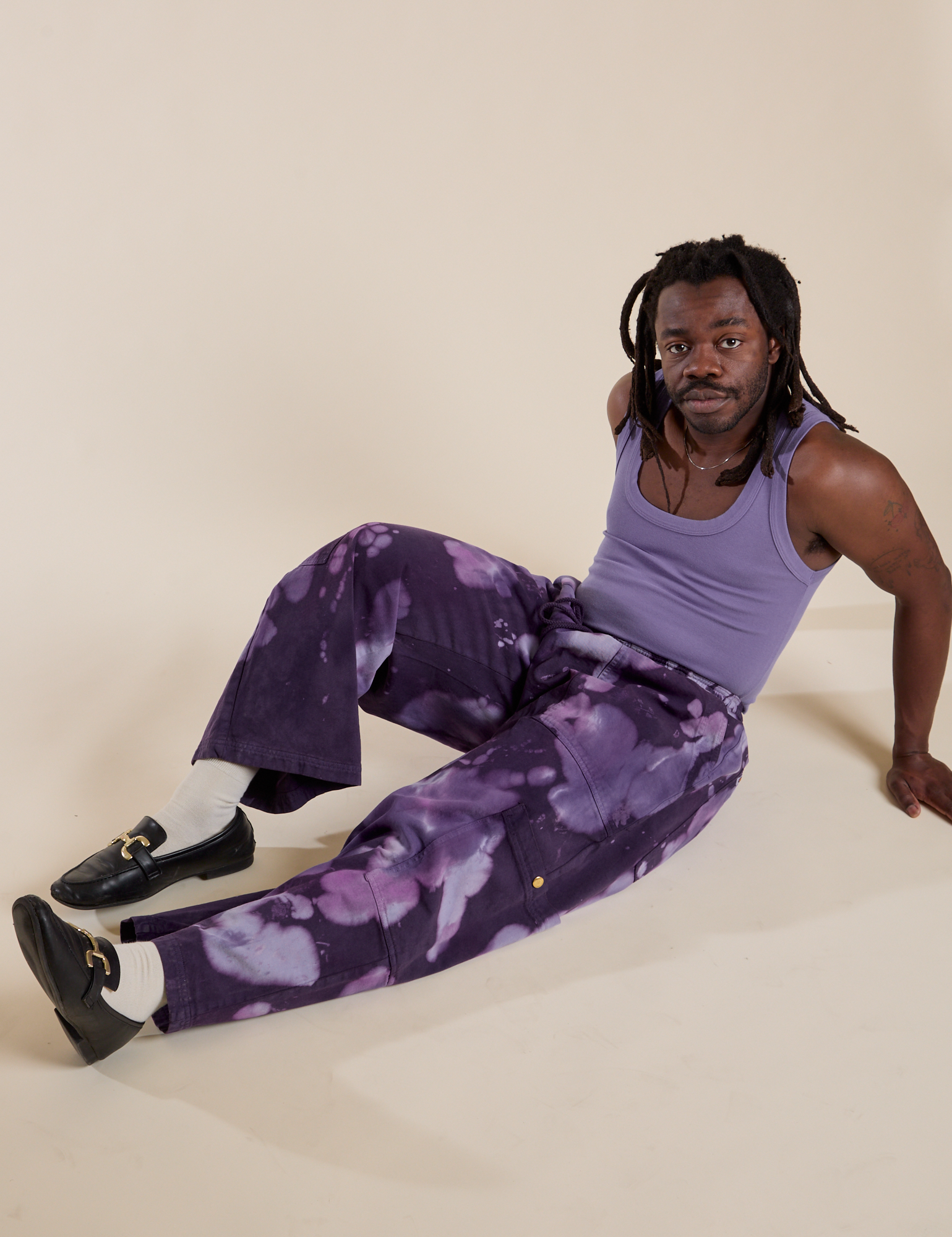 Demi is wearing Magic Waters Drop Pocket Pants in Dark Lavender and faded grape Cropped Tank