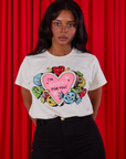 Kandia is wearing a tucked in Sweet 4 U Organic Tee