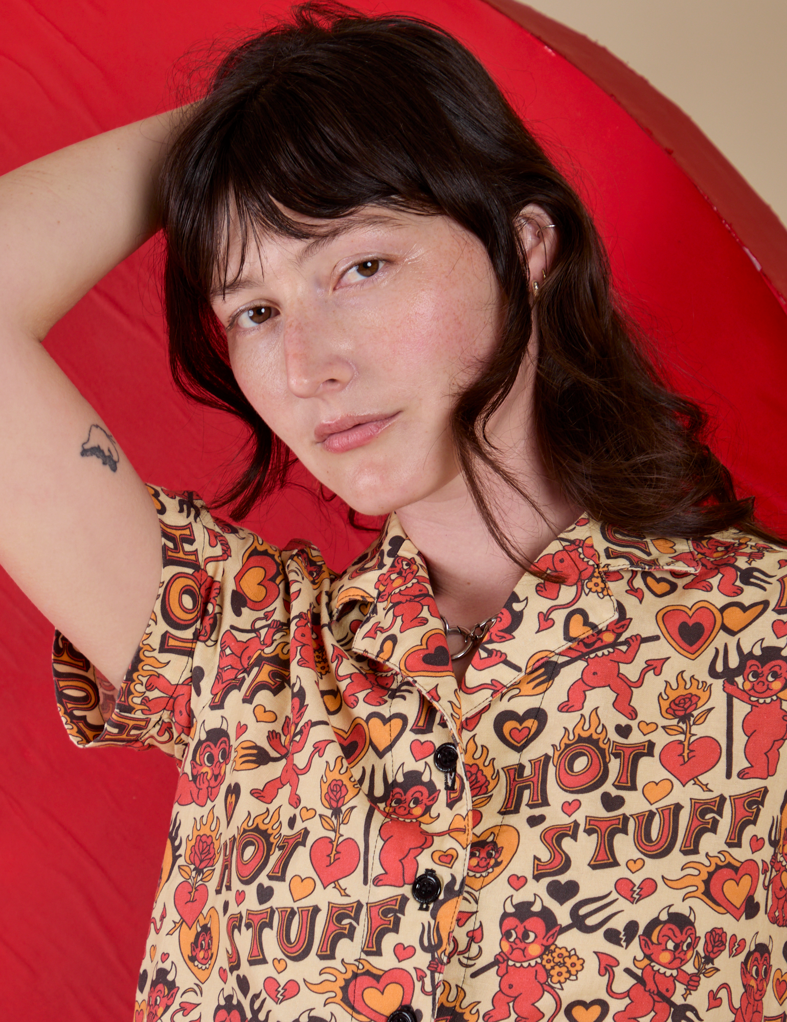 Front close up of Hot Stuff Print Pantry Button-Up on Alex