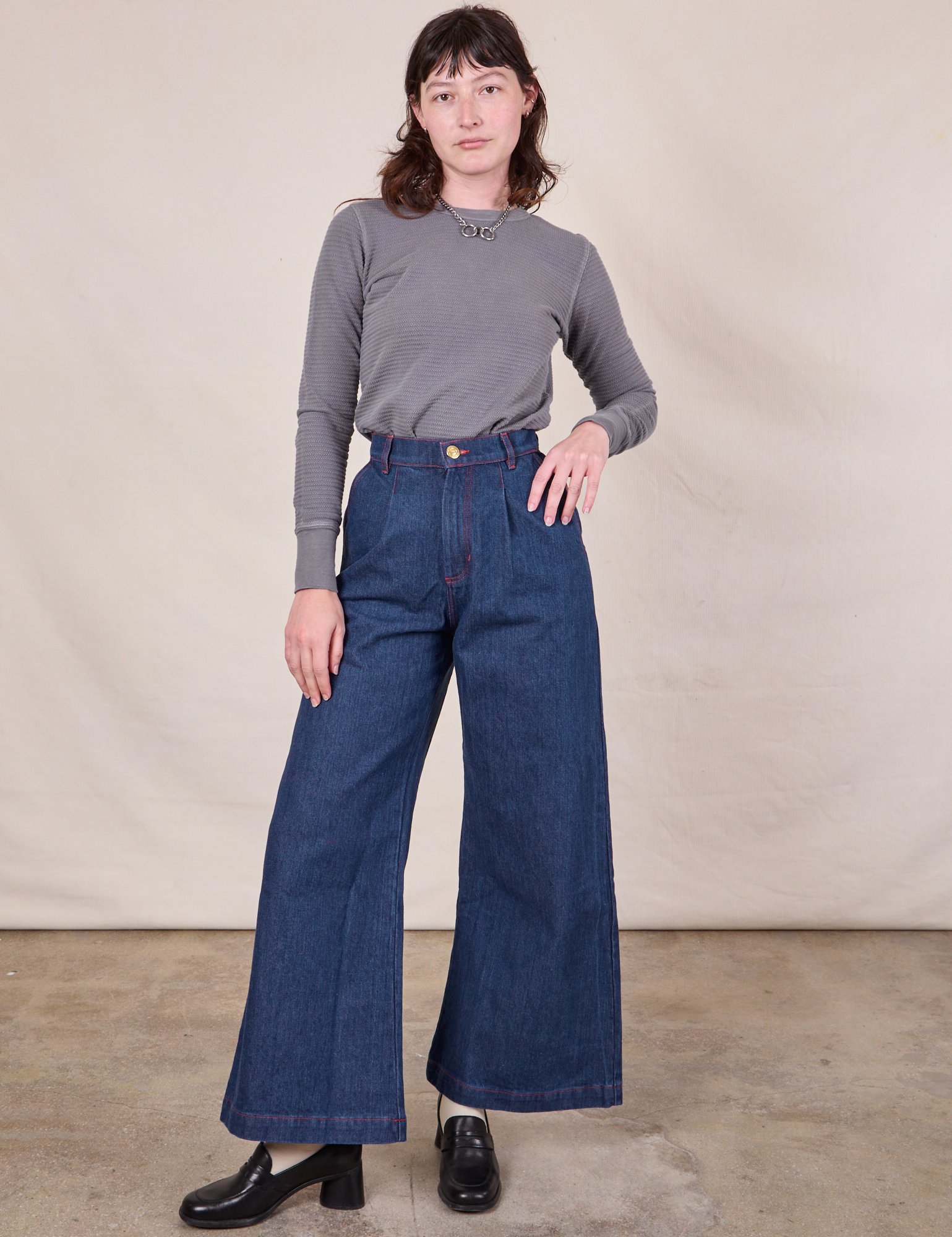 Alex is wearing Honeycomb Thermal in Washed Grey tucked into dark wash Wide Leg Denim Trousers