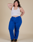 Ashley is wearing Work Pants in Royal Blue and vintage tee white Cropped Tank
