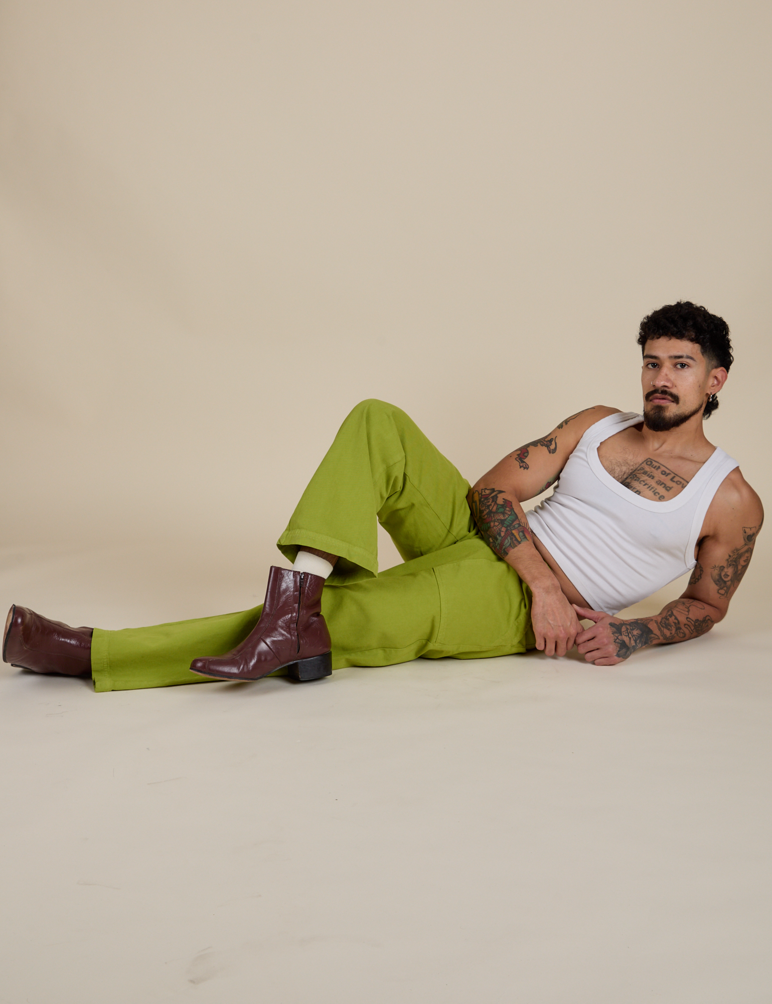 Work Pants in Gross Green and vintage tee white Cropped Tank on Jesse