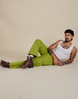 Work Pants in Gross Green and vintage tee white Cropped Tank on Jesse