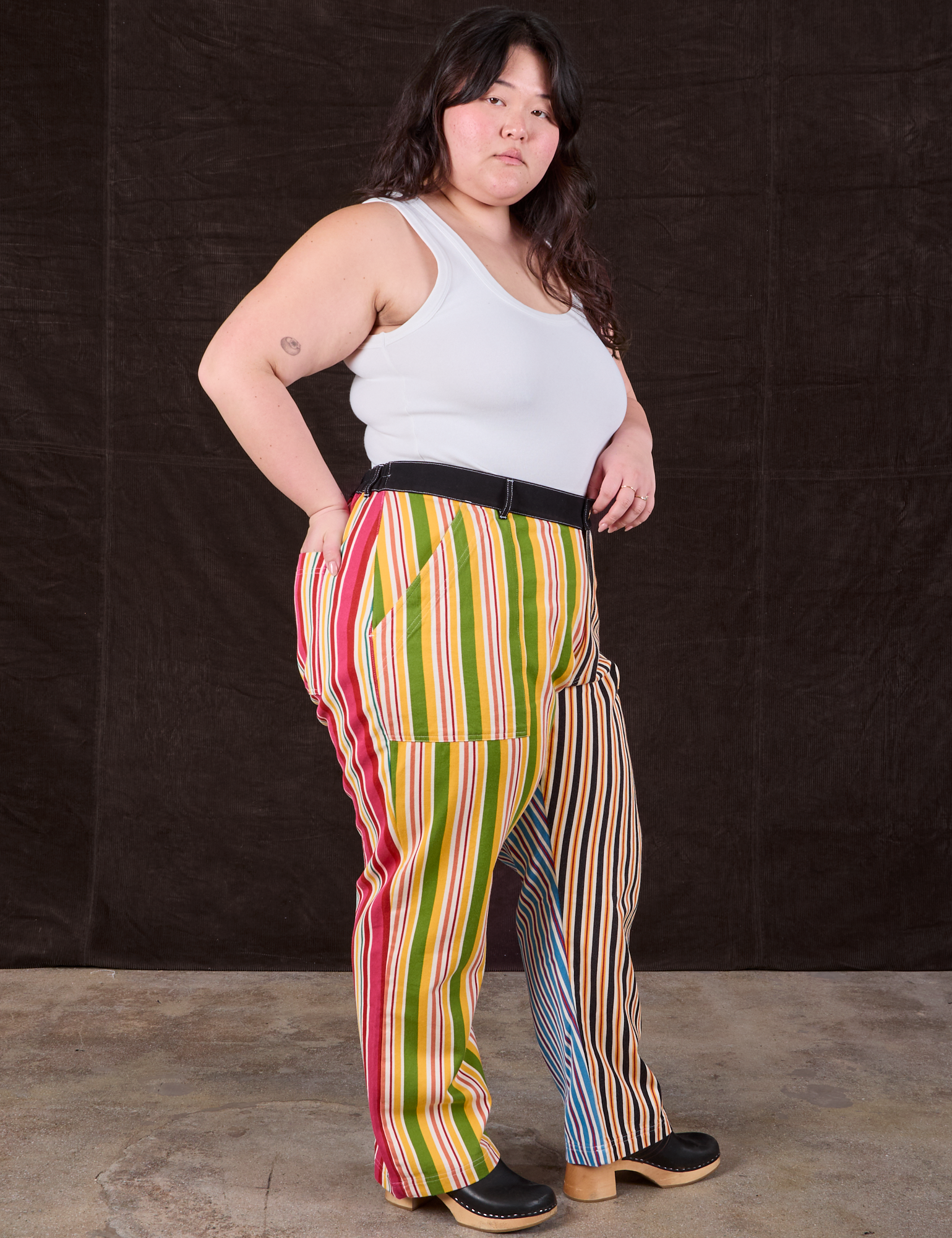 Side view of Mixed Stripe Work Pants and Tank Top in vintage tee off-white on Ashley