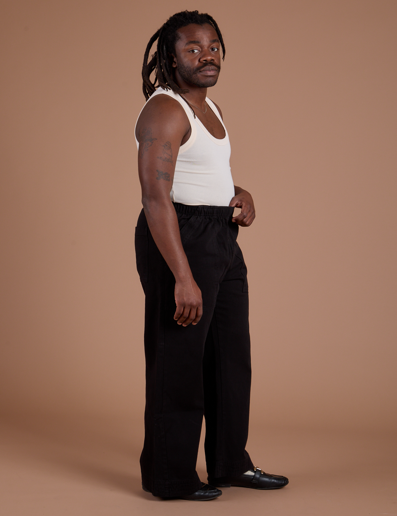 Action Pants in Basic Black side view on Demi