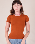 Alex is wearing Baby Tee in Burnt Terracotta