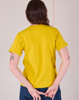 Burly Tee in Golden Yellow back view on Alex