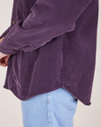 Corduroy Overshirt in Nebula Purple side curved hem close up on Alex