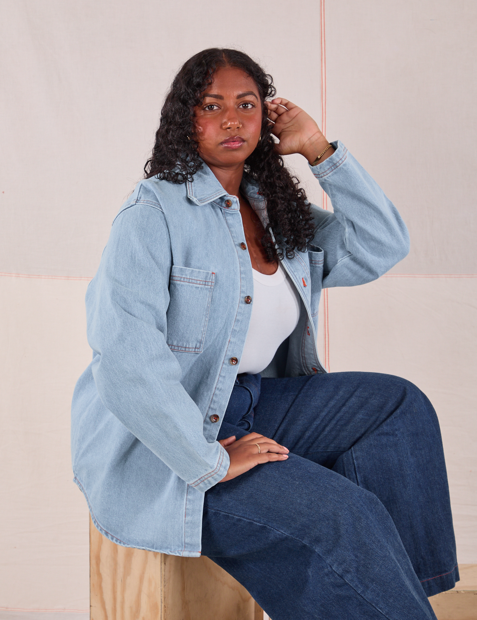 Meghna is wearing Denim Overshirt in Light Wash and dark wash Wide Leg Denim Trousers