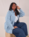 Meghna is wearing Denim Overshirt in Light Wash and dark wash Wide Leg Denim Trousers