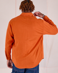 Flannel Overshirt in Burnt Orange back view on Isaac