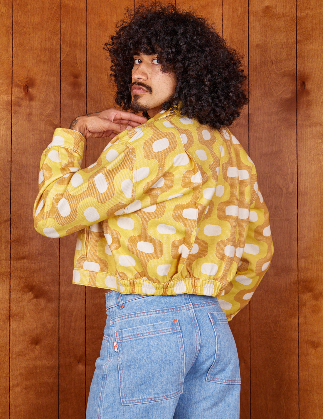 Angled view of Jacquard Ricky Jacket in Yellow worn by Jesse
