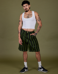 Jesse is 5’8” and wearing S Longline Work Shorts in Evergreen paired with Cropped Tank in Vintage Tee White