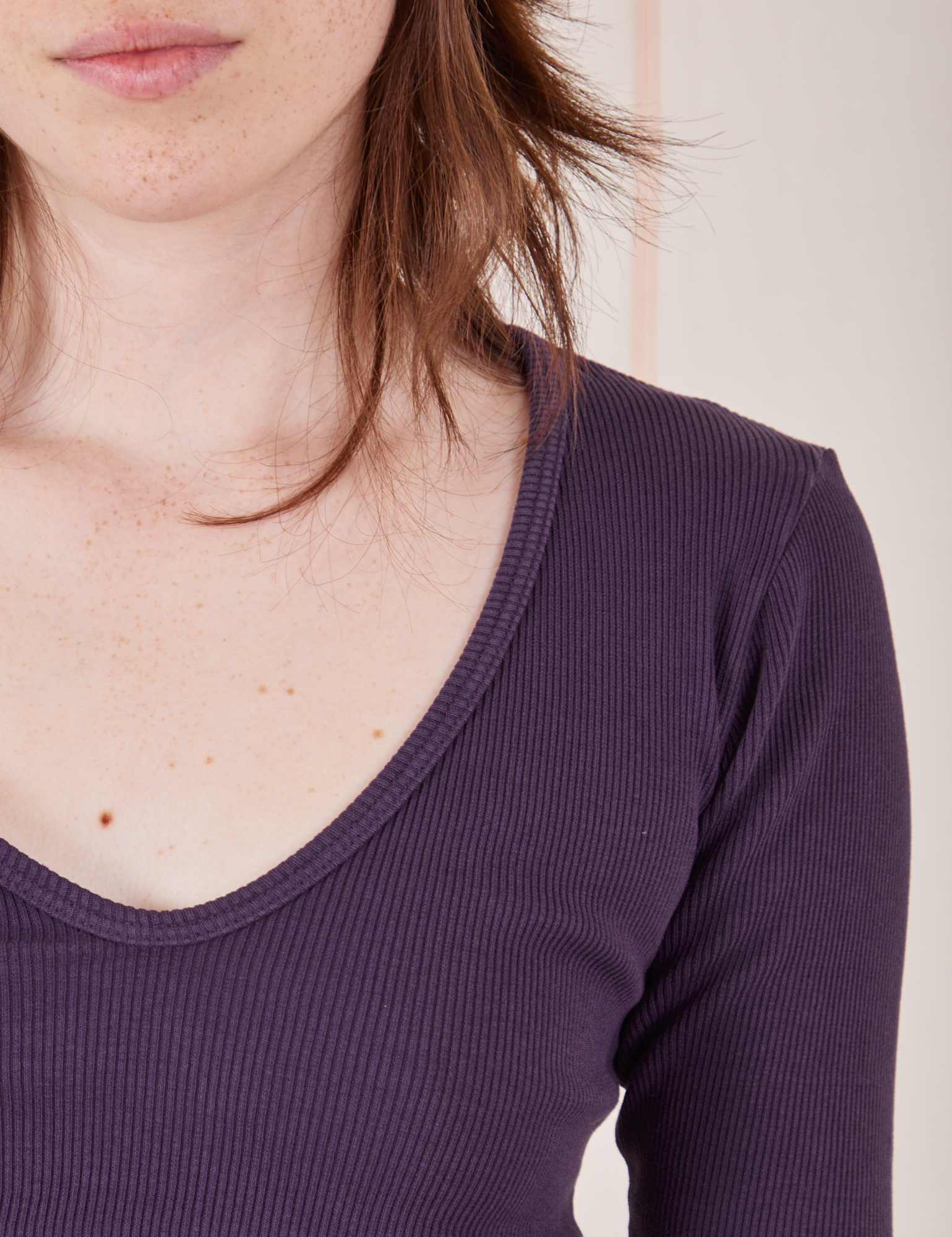 Front close up of Long Sleeve V-Neck Tee in Nebula Purple worn by Hana