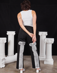Back view of Column Work Pants in Basic Black and vintage off-white Cropped Tank Top