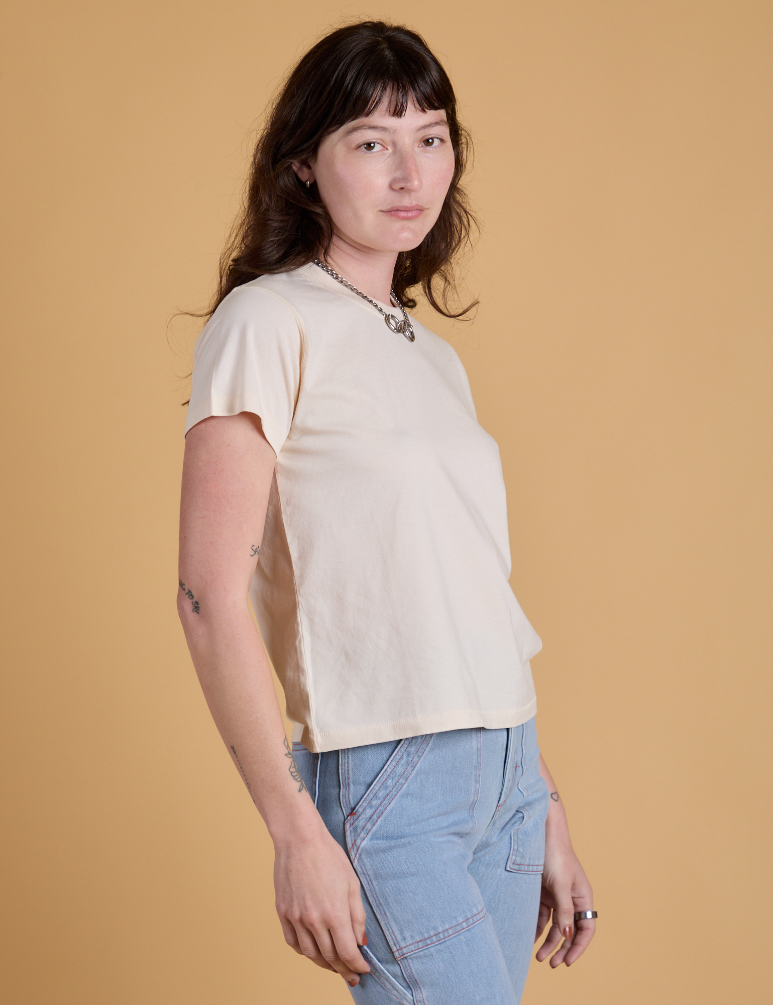 Organic Vintage Tee in Vintage Off White side view on Alex