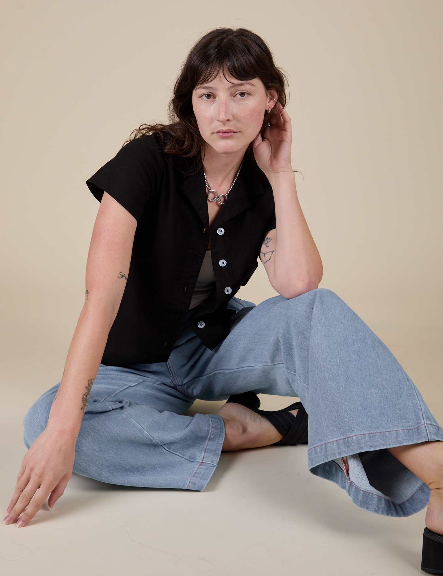 Pantry Button-Up in Basic Black and light wash Indigo Wide Leg Trousers on Alex