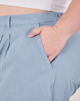 Heavyweight Trousers in Periwinkle front pocket close up. Ashley has her hand in the pocket.
