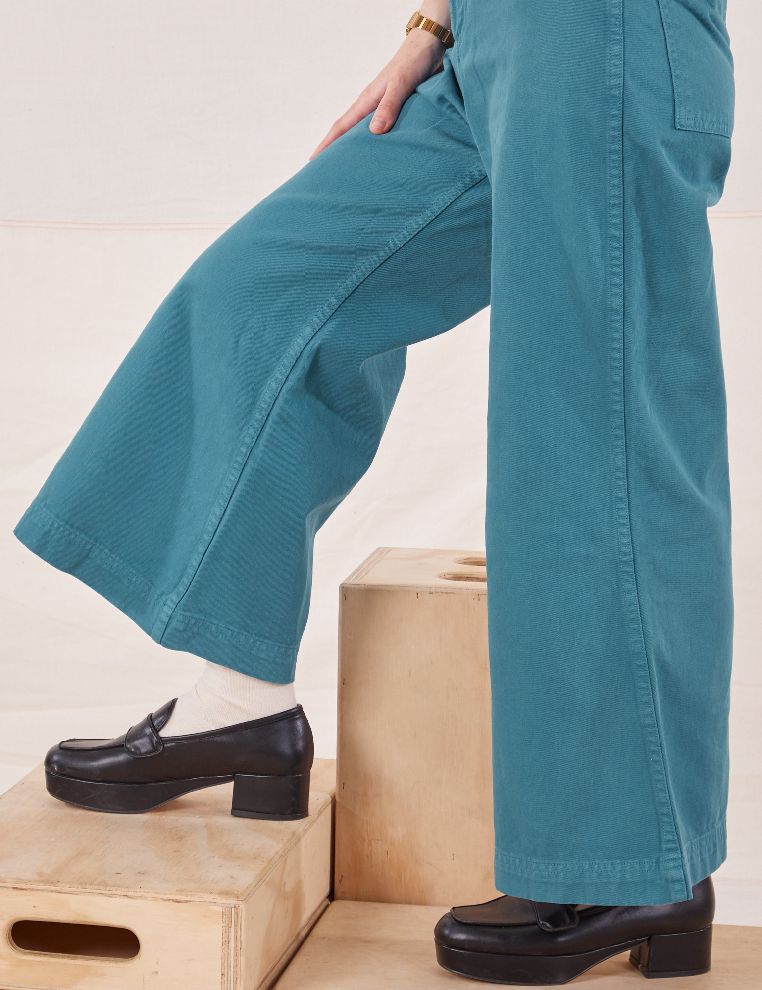 Petite Bell Bottoms in Marine Blue pant leg side view close up on Hana