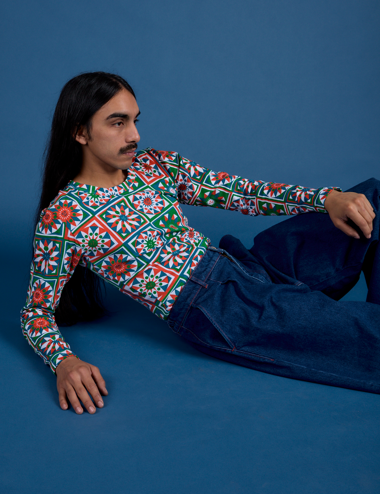 Long Sleeve Baby Tee in Quilt Print and dark wash Indigo Wide Leg Trousers on Anthony