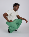 Drop Pocket Cargo Pants in Seafoam Green and Organic Vintage Tee in Vintage Tee White worn by Isaac