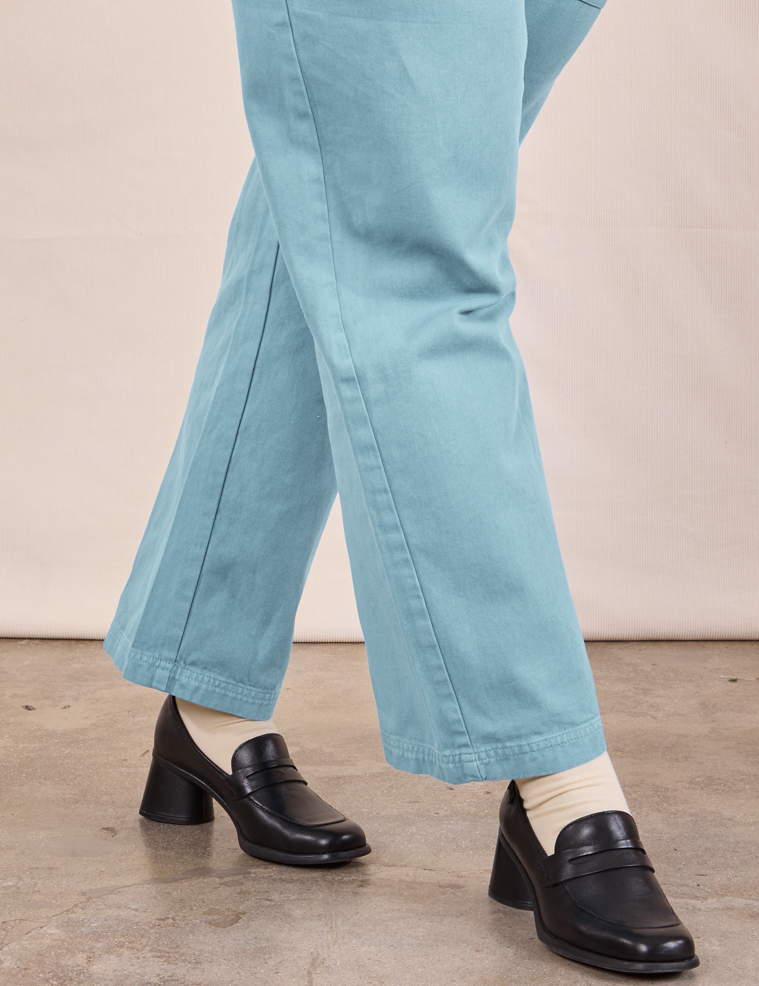 Short Sleeve Jumpsuit in Baby Blue pant leg close up on Lish