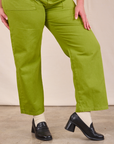 Short Sleeve Jumpsuit in Gross Green pant leg close up on Lish