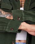 Sleeve cuff close up of Flannel Overshirt in Swamp Green on Jesse