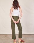 Back view of Work Pants in Surplus Green and Cropped Tank in vintage tee off-white on Alex