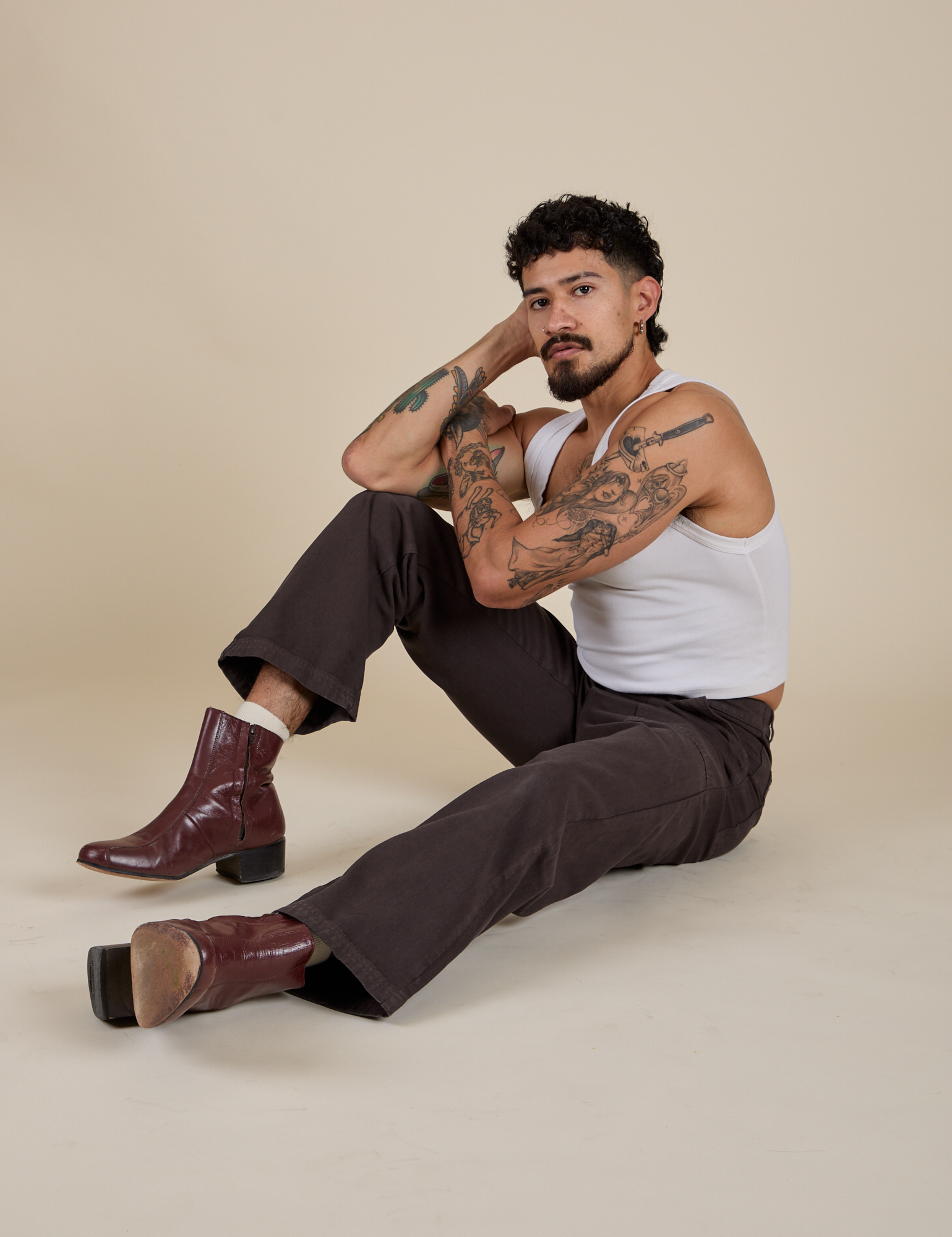 Work Pants in Espresso Brown and vintage tee white Cropped Tank worn by Jesse