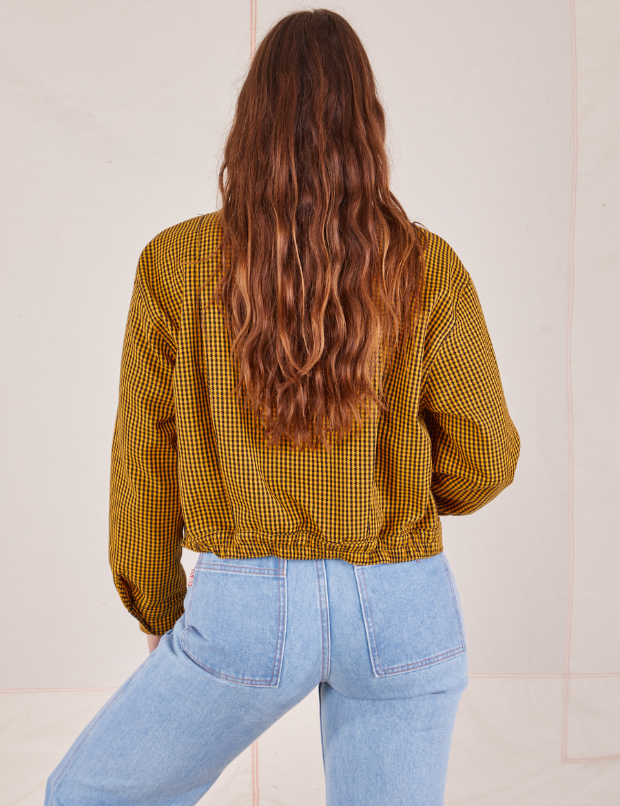 Back view of Ricky Jacket in Checker Yellow worn by Allison