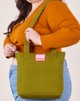 Over-Shoulder Zip Mini Tote in Olive Green worn on shoulder