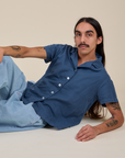 Anthony is wearing Pantry Button-Up in French Blue
