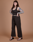 Action Pants in Espresso Brown angled front view on Sydney