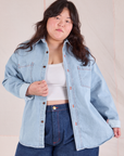 Ashley is 5'7" and wearing L Denim Overshirt in Light Wash