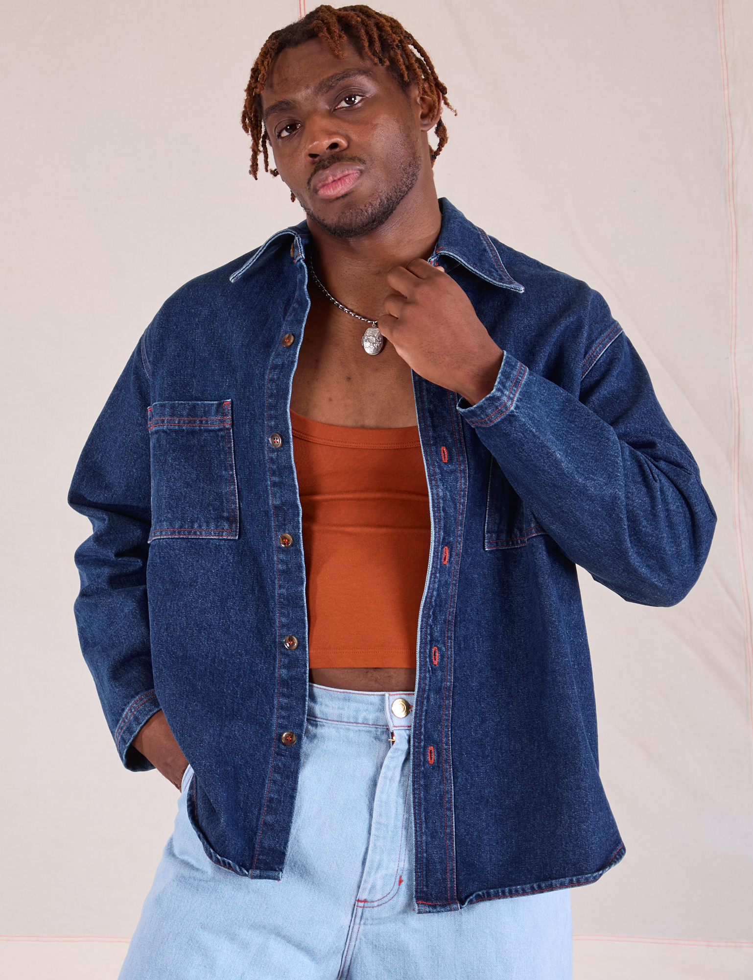 Issac is wearing Denim Overshirt in Dark Wash