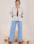 Tiara is wearing Denim Work Jacket in Dishwater White and light wash Sailor Jeans
