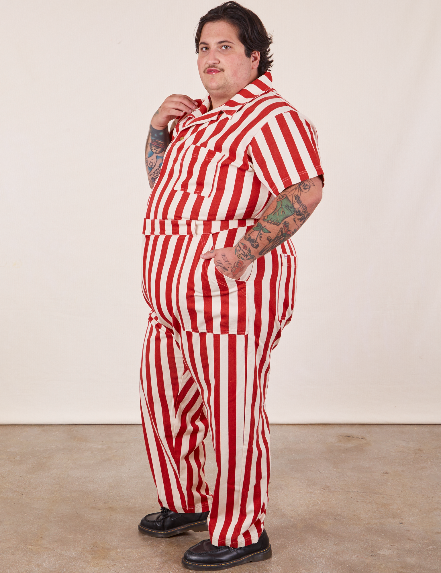 Side view of Cherry Stripe Jumpsuit worn by Sam