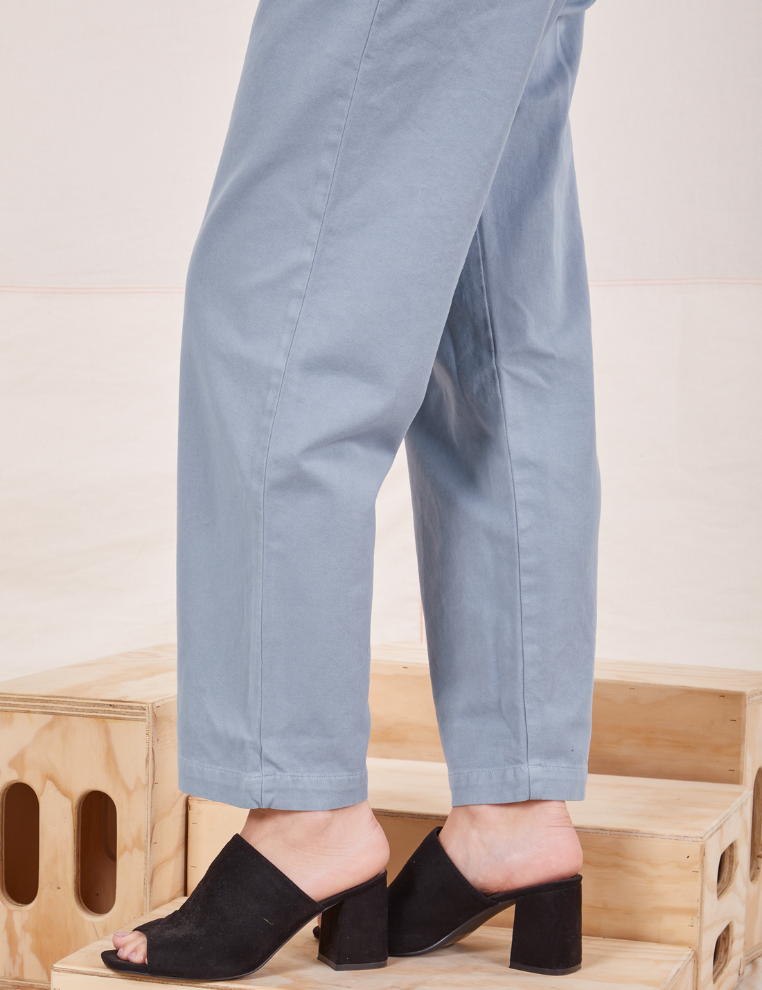Side view pant leg close up of Organic Trousers in Periwinkle worn by Alex