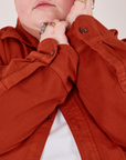 Oversize Overshirt in Paprika sleeve close up on Jordan