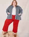 Catie is 5'11" and wearing 4XLRailroad Stripe Denim Work Jacket paired with paprika Western Pants