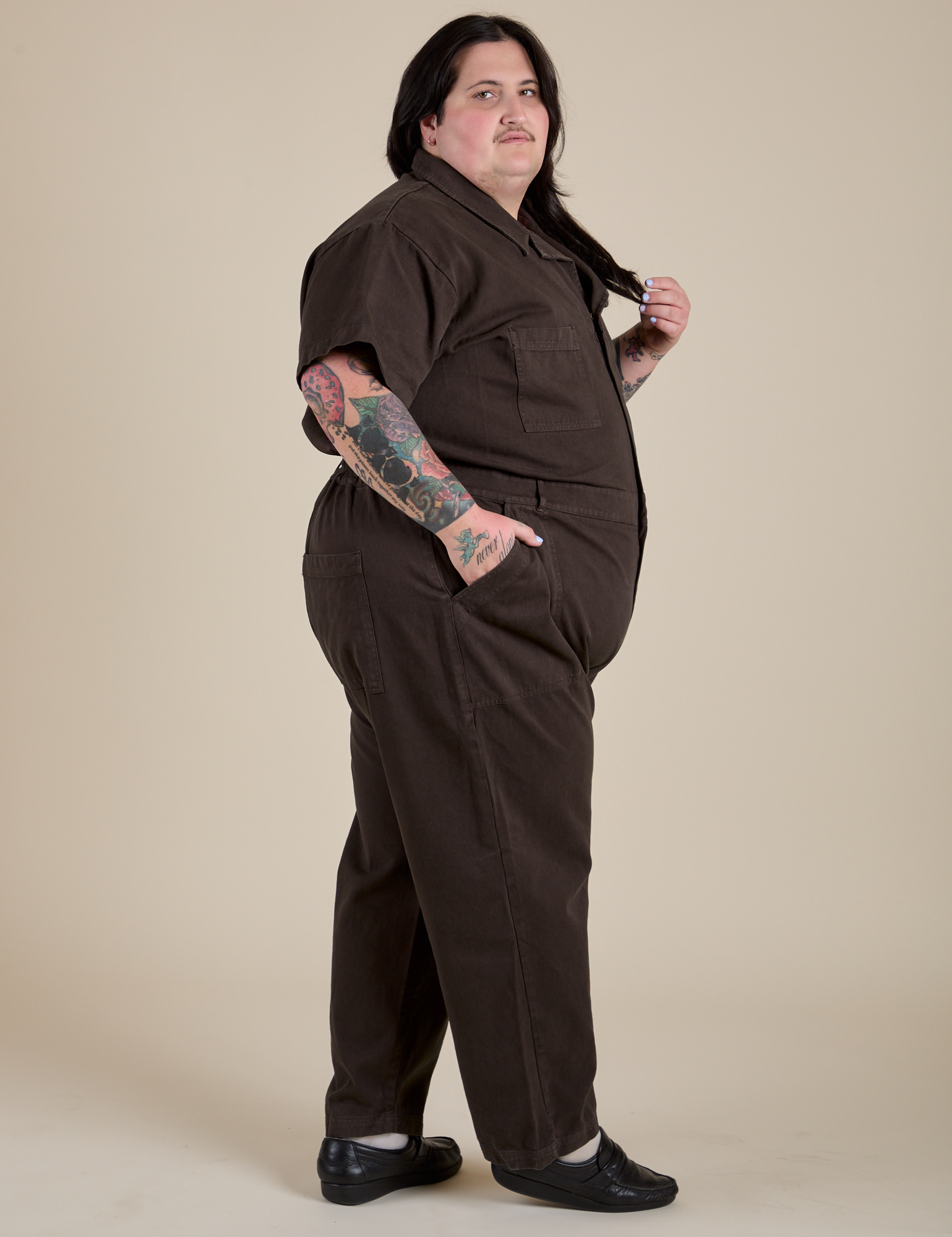 Side view of Short Sleeve Jumpsuit in Espresso Brown on Sam