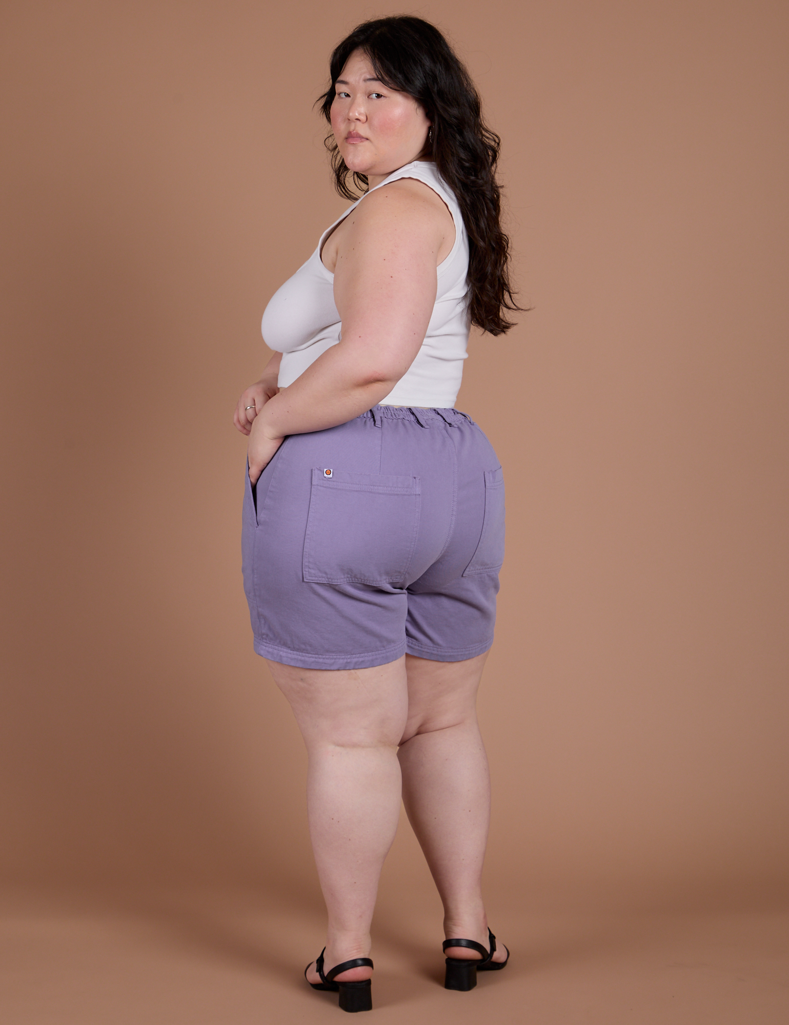 Angled back view of Classic Work Shorts in Faded Grape on Ashley