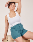 Tiara is wearing Classic Work Shorts in Marine Blue and Cropped Tank Top in vintage tee off-white